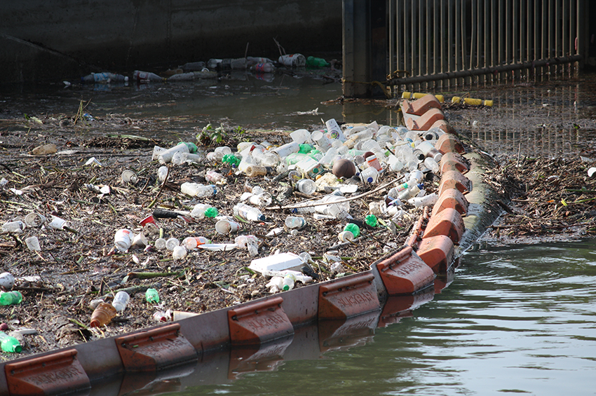 Trash trap filled with trash at Lake Munson 